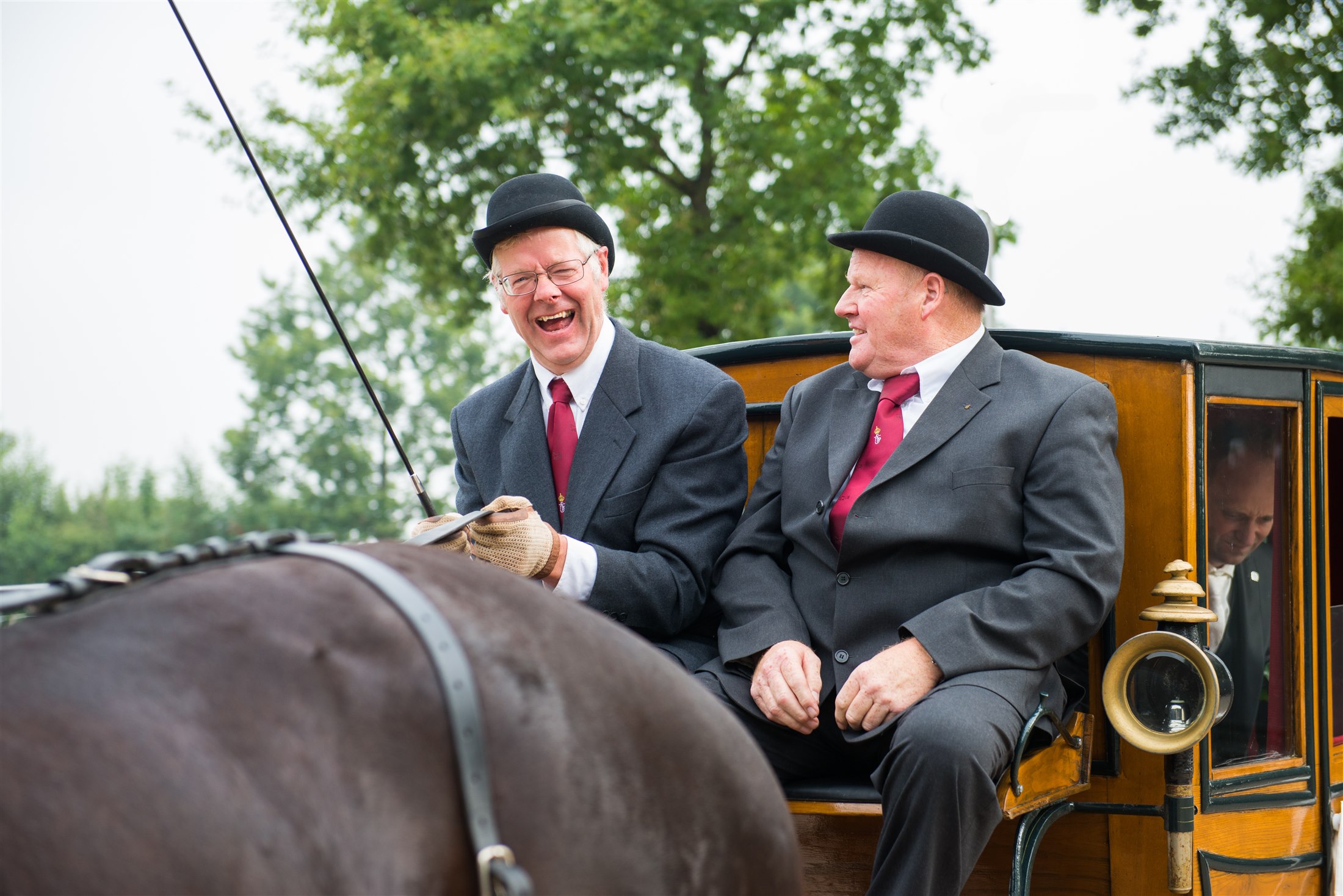 Koetsiers tijdens een trouwdag